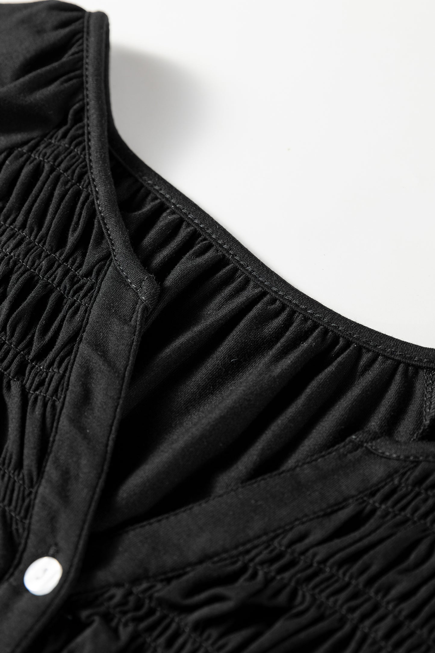 Black Smocked Bust Buttoned Split V Neck Flow Fit Blouse